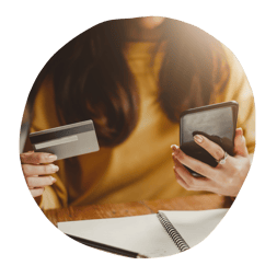 Woman Online Shopping On Her Phone with a Credit Card