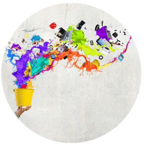 colorful paint exploding from a yellow bucket